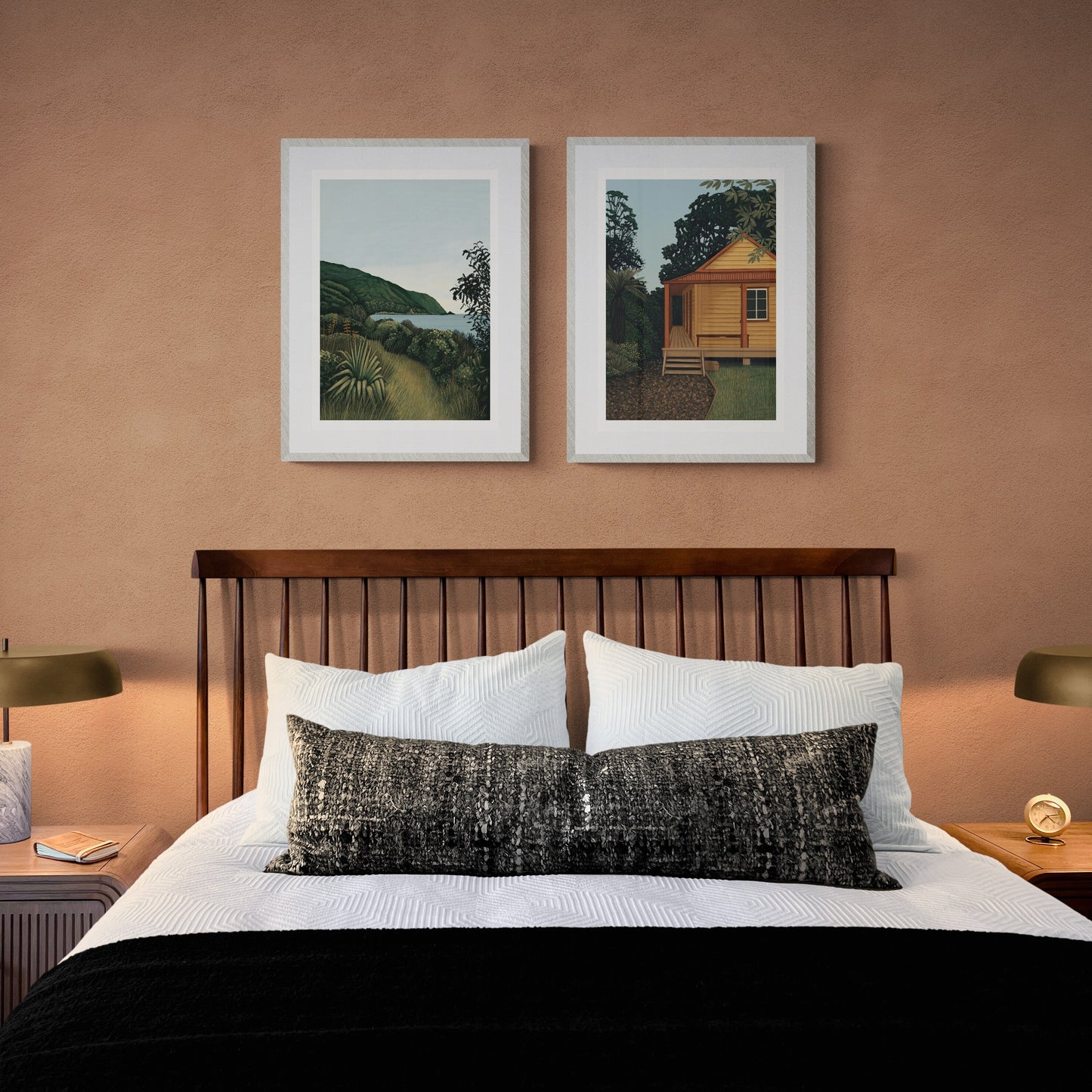 Bedroom with wooden bed, nightstands, and wall art on a peach-colored wall.