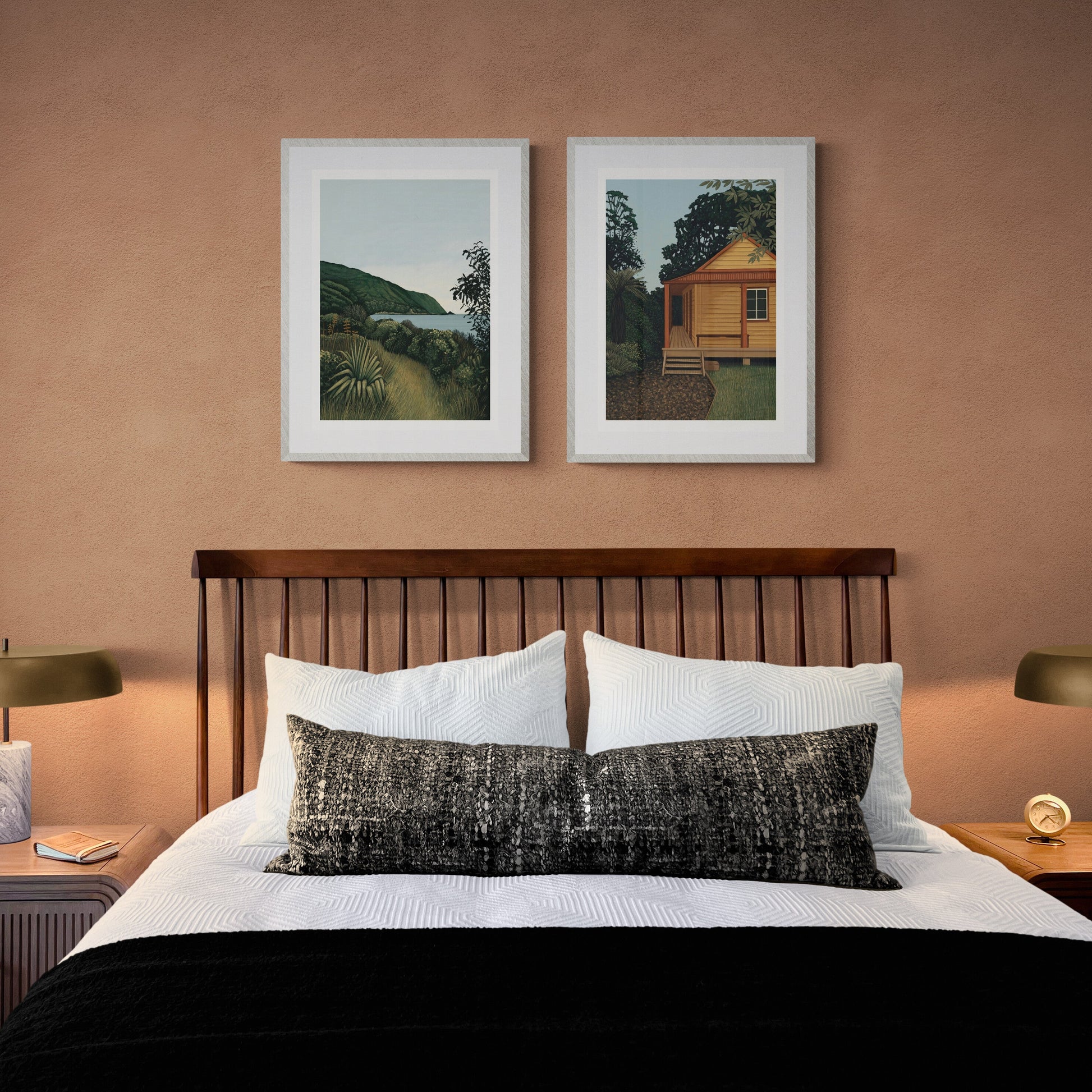 Bedroom with wooden bed, nightstands, and wall art on a peach-colored wall.